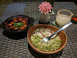 Nachos left and broccoli Caesar right, both amazing. Truly amazing. Eat this now. at Cuca in Jimbaran