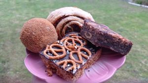 From top going clockwise, lentil and vegetable roulade, peanut butter brownie, salted pretzel flapjack, and the best scotch 'egg' you'll ever eat. at Grain & Goodness in Tynemouth