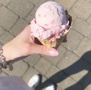 Vegan and Gluten Free Strawberry Scoop on a Vegan Waffle cone. at Harbourside Flavours in Bridlington