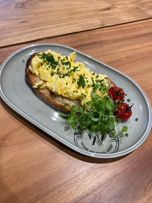 Our Good Morning sandwich, a slice of bread with scrambled eggs and chives. at Neue Weberei in Wernau