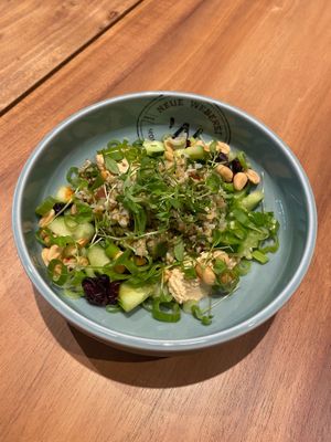 Our Tel Aviv Bowl with bulgur, hummus, spring onions, cranberries, nuts, cress and cucumber. at Neue Weberei in Wernau