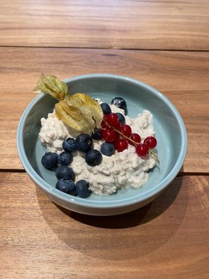 Our Bircher cereal with homemade Bircher cereal, grapes, walnuts and berries. at Neue Weberei in Wernau