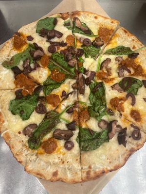 Fantastic Fun Guy with local wine-braised wild mushrooms, spinach, Italian sausage, kalamata and truffle oil at Slapped Woodfired Pizza - Pop Up in Minturn