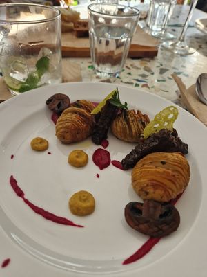 Tamari and red wine glazed tofu, thyme Hasselback potatoes,
caramelised leek ketchup, Calabrian liquorice gremolata at The Cooking Flea Supper Club in Bristol
