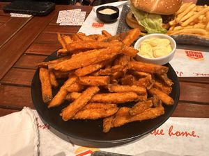 Sweet potato fries with vegan garlic dip  at Home Burger in Kos