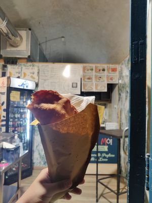 Panzerotto filled with vegan scamorza and a typical local filling comprised of tomatoes and onions. at Fusci mói in Lecce