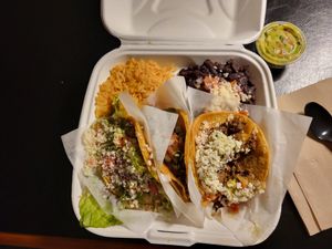 Taco platter and side of guacamole at Tacotarian in San Diego