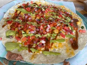 Mexican Pizza - delicious! Limited time only. Sept and Oct 2024. at Tacotarian in San Diego