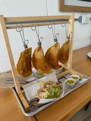 Birria Empanadas - fantastic! Also 2 tacos. Perfect for 2 people. Watch for this special again. Was available in July and August in 2024. at Tacotarian in San Diego