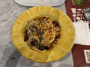 Spaghetti with capers, olives, lemon peel shavings and toasted bread crumbs.  at Al Dente Spaghetteria in Salerno