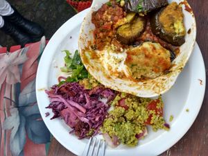 Moussaka with salad at Willow Vegetarian Garden Restaurant in Totnes