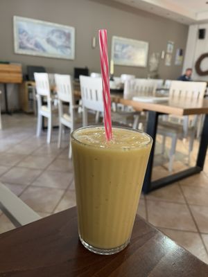 Mango smoothie with plant based milk for 50c extra  at Heaven's Cafe in Naxos