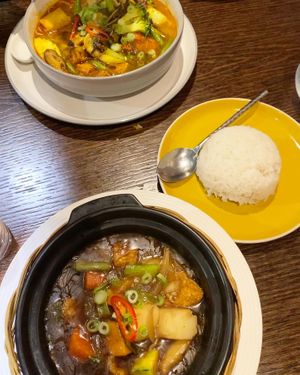 Spicy noodle soup and tofu clay pot with sticky rice   at Sen Viet Vegan in Edinburgh