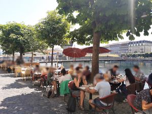 Riverside seating at Vincafe La Barca in Luzern