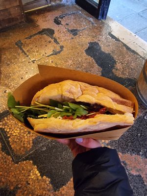 Vegan focaccia with ruccola, sun-dried tomatoes, potatoes and onions at I' Bacaro de' Bischeri in Venice