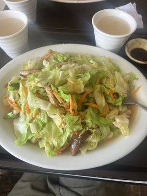 Cabbage salad with mushrooms served with guayaba juice  at Pu Ti in San Jose