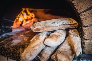 We bake our own bread daily in our wood oven at Avli in Malia in Crete