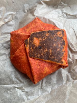 Lava crunchwrap - extra spicy volcano nacho cheese within! at Vegan Van @ Park Hill Kitchens in Denver