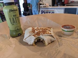 Crunch wrap with salsa and oat latte at Vegan Van @ Park Hill Kitchens in Denver