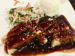 Sesame tofu served with white rice and sprouts/veggies at Zen Forrest in New Port Richey
