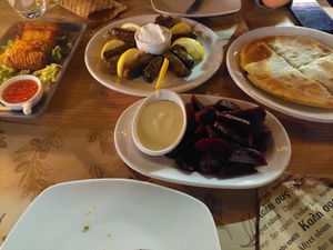 Beetroot, stuffed vine leaves (the yogurt isn't vegan), spinach pie and fried eggplant pies at Art & Taste in Rhodes