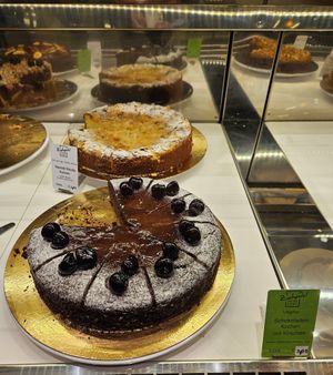 Chocolate cake with cherries at Zurheide feine Kost Pâtisserie in Dusseldorf