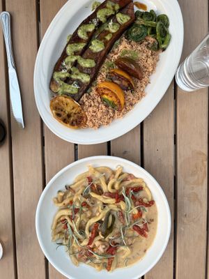 Top: roasted eggplant. Bottom: vegan lobster casarecce  at Jardin in Madison