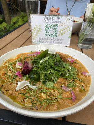 . $22
CHICKPEA CURRY
kabocha squash, shiitake mushroom, blue potato, caramelized sweet onion, fried green tomato, cilantro slaw. One of my delicious favorites.￼  at Jardin in Madison