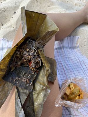 Mushroom mix wrapped in banana leaf and a non-spicy tofu curry  at Mae Orathai Vegetarian in Phuket