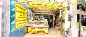 outside the restaurant.  at Mae Orathai Vegetarian in Phuket