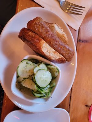 Vegan brat with cucumber salad at Kansas City Bier Company in Kansas City