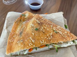 Vegetable Sesame Pancake Sandwich: Cilantro, Carrots & Cucumber. at Vanessa's Dumpling House in New York City