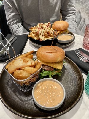 Mamma Mia burger and cheeseburger with spicy potato wedges and loaded cheese and bacon fries   at Bvrger in Montreal
