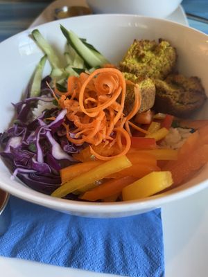 Sauce is on the side for you to drizzle on top. I used it all and was happy with amount.   at Knocks Cafe in Sussex