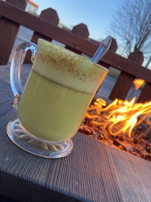 Spicy Ginger Tumeric Latte made with oat milk. So tasty. And on the heated winter patio. Amazing.  at Knocks Cafe in Sussex