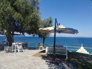 Outdoor seating at Anchor Beach Bar in Corfu