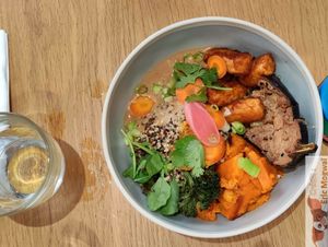 General Tao Tofu, Thai peanut ginger sauce, quinoa, miso glazed eggplant, sweet potato, pickles, spring onion, coriander at Ground to Grow in Paris
