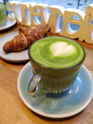 Matcha Latte and croissant at Ground to Grow in Paris