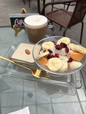 Fruit bowl and latte  at Citronella in Oaxaca