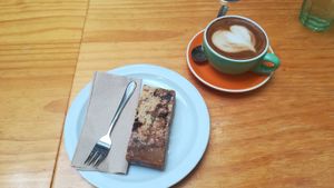 Vegan tan square and oat milk flat white at Antonio's Cafe in Palmerston North