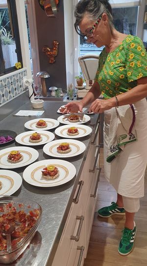 Cheffe Carole preparing a diner at Au 46 en Bretagne in Benodet