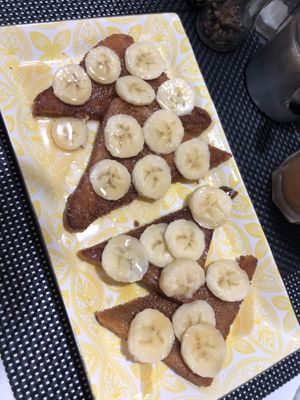 Coffee Maple French toast with banana (~8€)  at Caffè dell'Arte Specialty Coffee in Cagliari