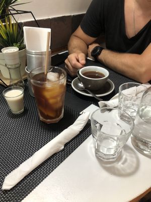 Water, Cold brew with oat milk (4,50€) and americano (~1,50€)  at Caffè dell'Arte Specialty Coffee in Cagliari