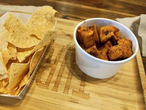 Side of tortilla chips and side of roasted sweet potatoes made by special request at Turco Taco in Naples