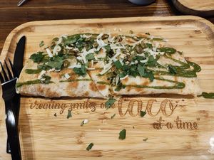 Vegetable quesadilla made vegan by substitution of vegan cheese for additional $1.59 charge. Cheese tasted like Daiya at Turco Taco in Naples