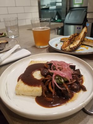 Yummy "meaty" mushroom sauce over the miso grit cake at Black Radish in Tallahassee