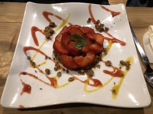 Homemade granola topped with yummy strawberries and sauces.  at V&G in Avignon