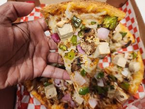 Vegan chicken tikka masala pizza at Pizza Twist in Mckinney