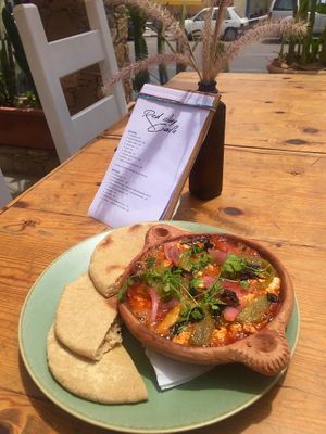 Shakshofu 
Homemade tomato sauce/fresh tofu/mushroom khlee/pickles/marinated peppers.
*Served with batbout at Redclay Cafe in Taghazout
