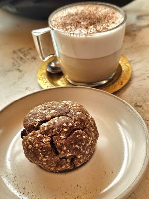 Wonderful oat and raisin cookie, delicious almond chai latte. at Redclay Cafe in Taghazout
